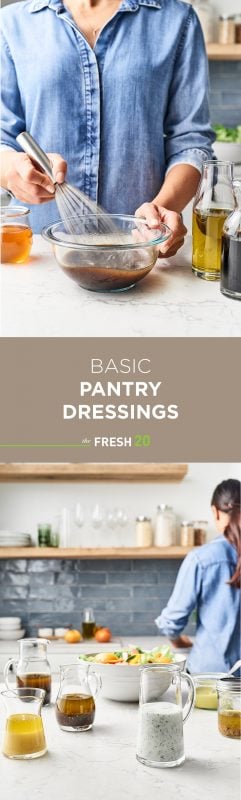 Woman making 7 homemade versatile pantry dressings with a fresh colorful salad on a white marble counter in a beautiful kitchen