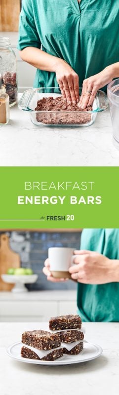 Woman making no bake breakfast bars in a glass baking dish & bars stacked on a plate in front of a woman with a cup of tea in a beautiful white marble kitchen