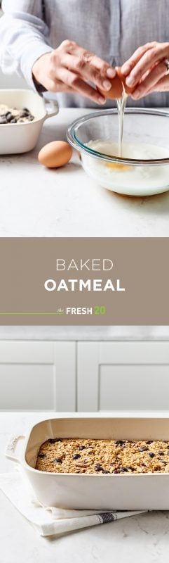 Woman cracking eggs into glass bowl to make a baking pan full of baked oatmeal on a white marble surface