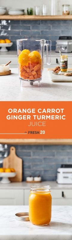 Mason jar and blender full of orange carrot ginger turmeric juice on a white marble counter in a beautiful modern kitchen