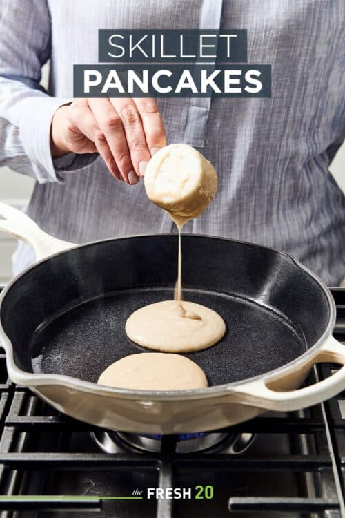 Woman pouring creamy paleo pancake batter into skillet on a gas cooktop